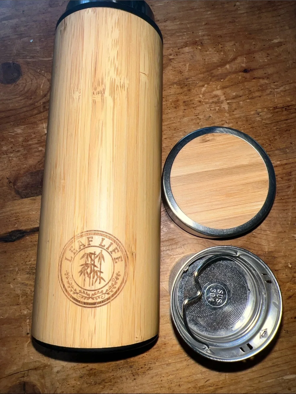 Preowned LeafLife branded 17oz vacuum-insulated bamboo tumbler designed for tea